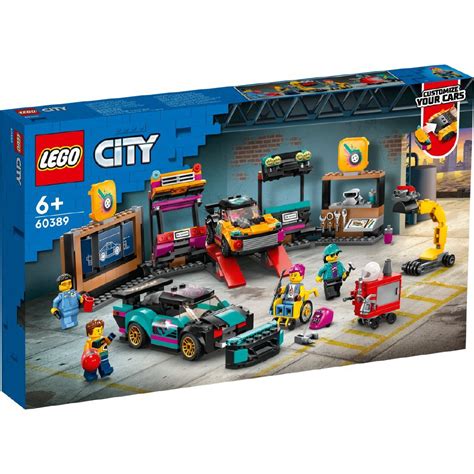 the lego city garage playset is packed with cars and tools, including a ...