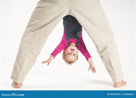 Father Holding Baby Toddler Upside Down Stock Photo Image Of