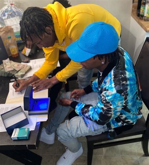 Lil Baby Shares Lil Kee Signing In Louis Vuitton And Amiri On Instagram