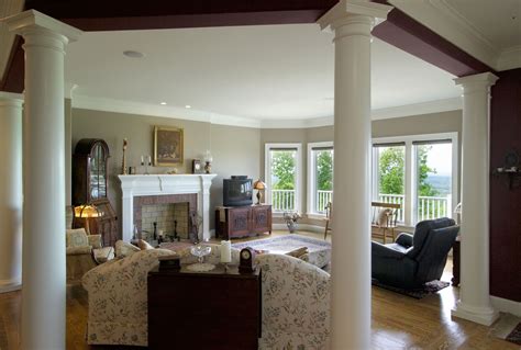 The Columns In This Living Room Separate The Space From The Kitchen But