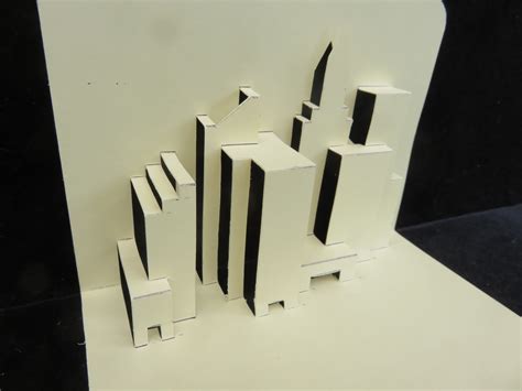 Learn How To Cut And Fold Your Own Origami Buildings