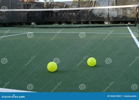 Green Pickleballs on Outdoor Court Stock Image - Image of court, ready ...