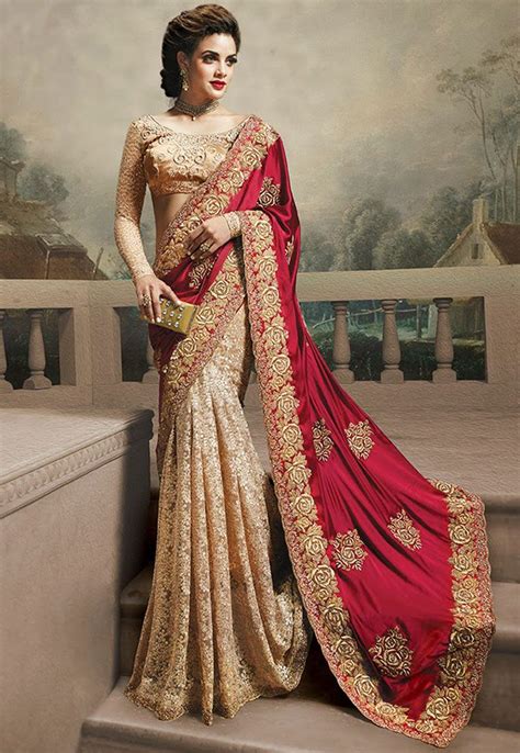 A Stunning Maroon Cream Color Satin Net Designer Saree Featuring A