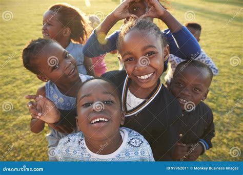 Elementary School Kids Having Fun Outdoors High Angle Stock Image