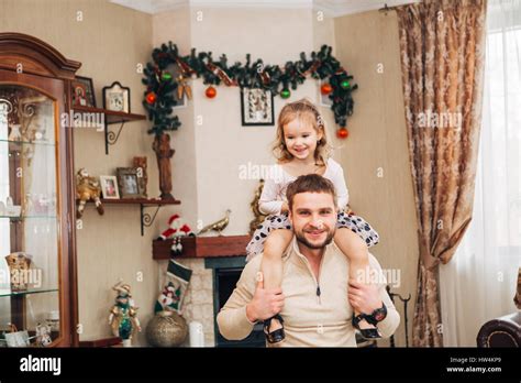 Happy Little Girl Sitting On Dads Neck Stock Photo Alamy