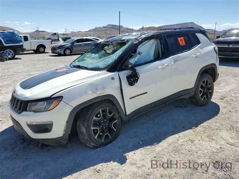 Report 3c4njddb5kt739697 Jeep Compass 2019 White Gas Price And Damage