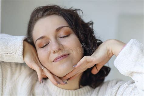 Close Portrait Of Young Happy Pleased Brunette Girl With Closed Eyes