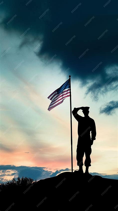 Premium Photo A Silhouette Of A Soldier Saluting The Flag