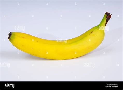 Unpeeled banana hi-res stock photography and images - Alamy