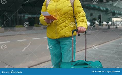 Crop View Of Senior Woman Holding Passports And Boarding Passport With