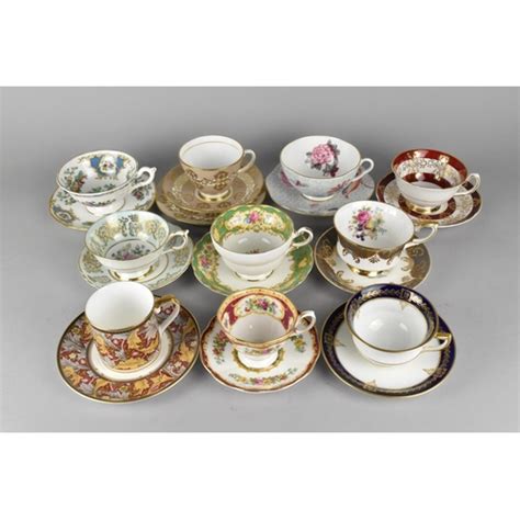 A Collection Of Various Cabinet Cups And Saucers To Include Examples By