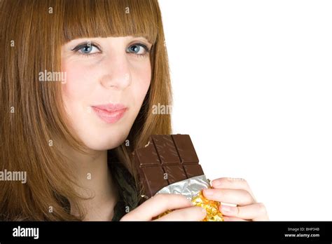 Pretty Blonde Eating Chocolate Isolated On White Background Stock Photo Alamy