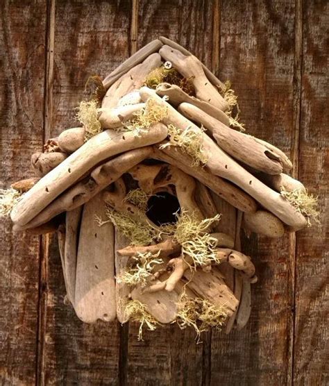 A Bird House Made Out Of Drift Wood