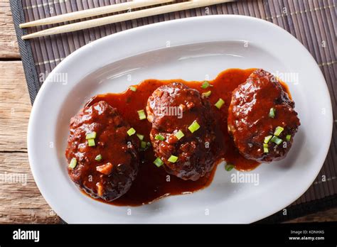 Homemade Japanese Hambagu Steak With Sauce Close Up On A Plate