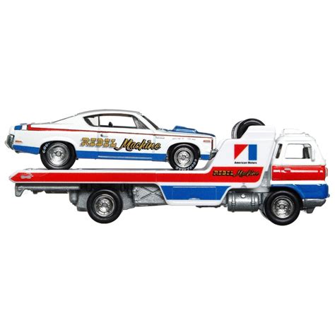 Hot Wheels Team Transport Fahrzeuge Truck mit Anhänger und Race Car AMC Rebel Machine Smyths