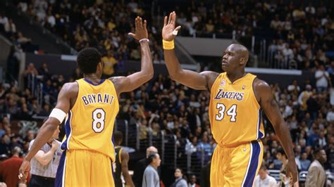 Shaquille O'Neal encourages Los Angeles Lakers veteran Kobe Bryant