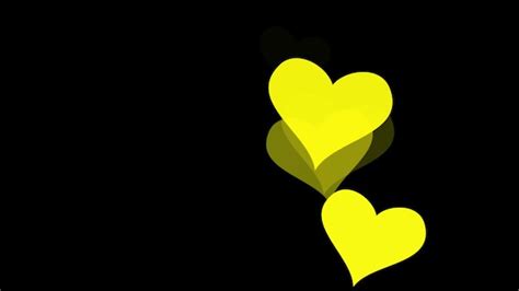 Premium Photo Yellow Hearts On Black Background