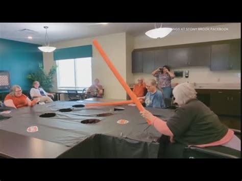 Louisville Senior Living Residents Enjoy Game Of Whack A Mole With