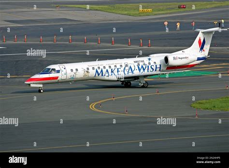 American Eagle Make A Wish charity promotion airplane, airport arrival