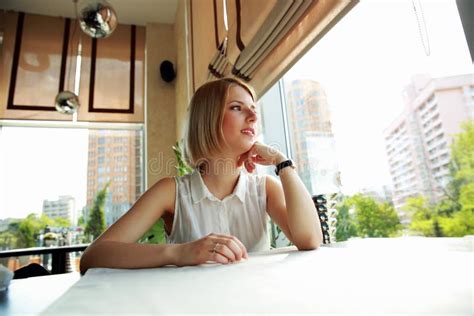 Woman Sitting Alone In Cafe Stock Image Image Of Horizontal Hair