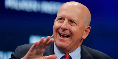 goldman beats  revenue earnings  investment banking fees surge