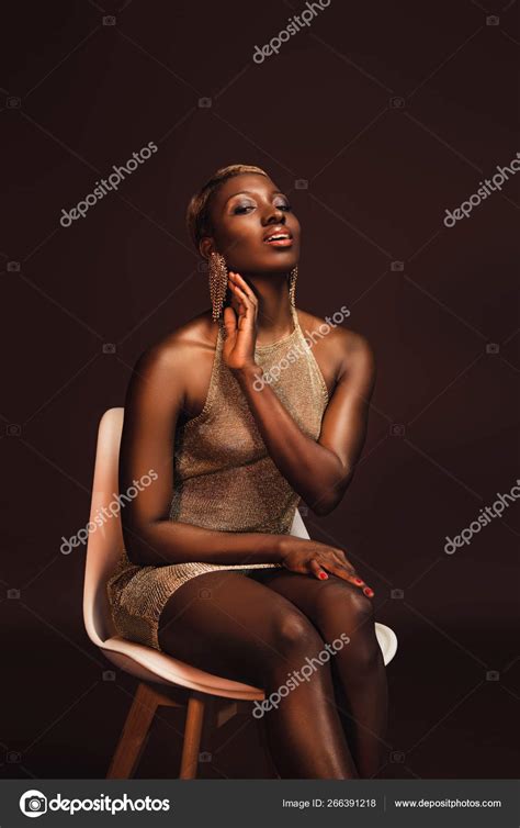 Attractive African American Woman Sitting Chair Isolated Brown — Stock