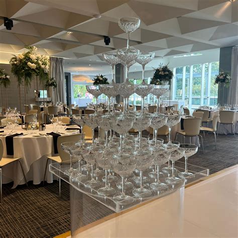 Champagne Towers Are A Must At Modern Weddings