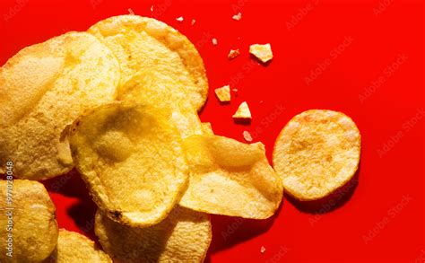 potato chips  red background homemade rustic chips border design