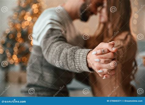 Standing And Holding Hands Of Each Other Lovely Young Couple Are