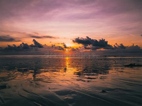 Sunset On Kuta Beach Bali Stock Photo Image Of Group 8937446