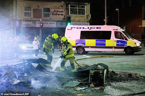 Leeds In Rubble Clear Up Begins After Night Of Shame Which Saw A Patrol Car Tipped Over And A