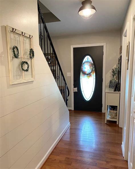 Farmhouse Entryway With Shiplap And Wrought Iron Handrail Soul And Lane