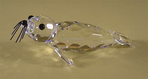 Swarovski Seal Large V Black Nose And Whiskers Looks Left Most