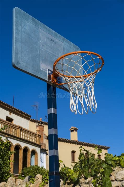 Basketball hoop in a park stock image. Image of street - 258321621