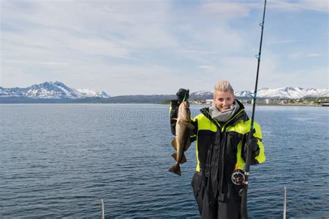 Beautiful Girl Fishing in Northern Norway Stock Image - Image of boat, reel: 90122765