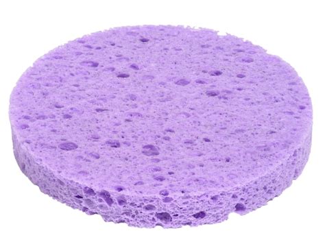 Premium Photo Round Purple Makeup Sponge On A White Isolated Background