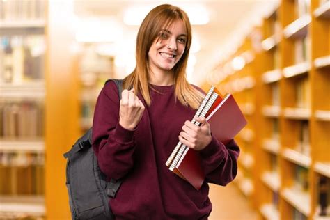 Premium Photo Lucky Student Woman On Unfocused Background Back To School