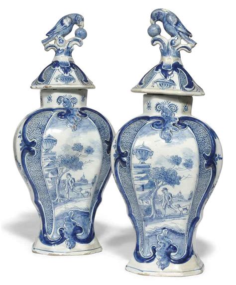 A Pair Of Dutch Delft Vases And Covers 19th Century Christies