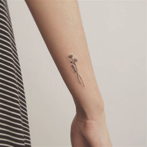 Small And Delicate Floral Tattoo Ideas Side Wrist Tattoos