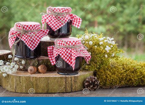 Still Life With Jars Of Jam And Decoration In Rustic Style Stock Image