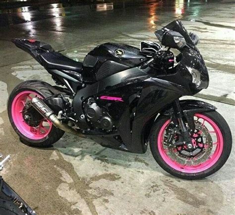 Pretty Pink Motorcycle With Black Rims