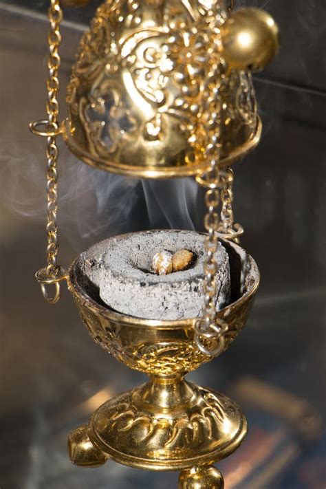 Brass Thurible Liturgy Censer With Burning Incense In It Stock Image