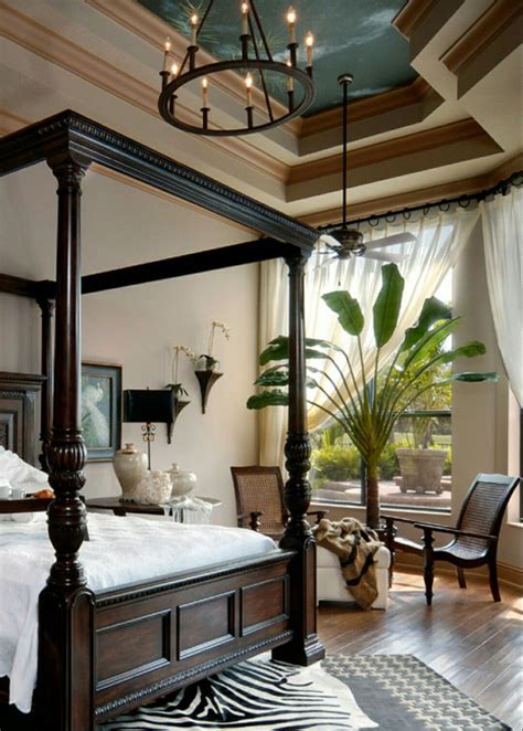 British Colonial Bedroom With Zebra Rug And Four Poster Bed