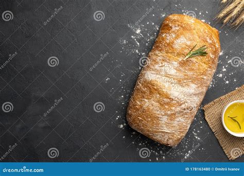 Sliced Italian Ciabatta Bread On Black Background Top View Flat Lay