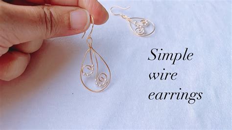 Wire Wrapped Earrings Making Beautiful Wire Wrapped Pearl Earrings Simple Diy Earrings Handmade