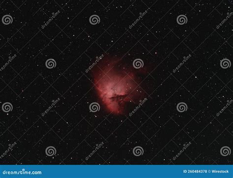 Una Vista Cautivadora De La Nebulosa Del Pacman En El Espacio Ideal