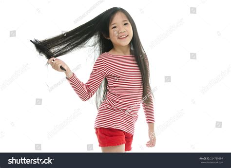 Little Asian Girl Smiling Brushing Hair Stock Photo 224789884 ...