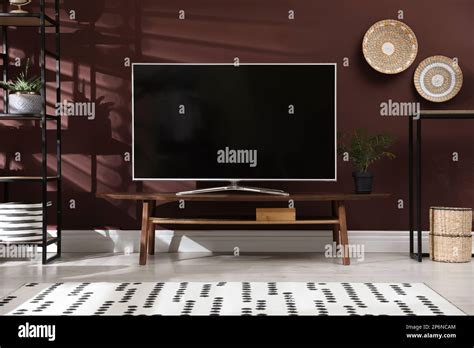 Living room interior with modern TV on stand Stock Photo - Alamy