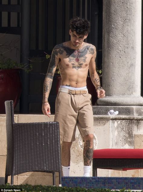 Shirtless Zayn Malik Shows Off His Heavily Inked Torso Daily Mail Online