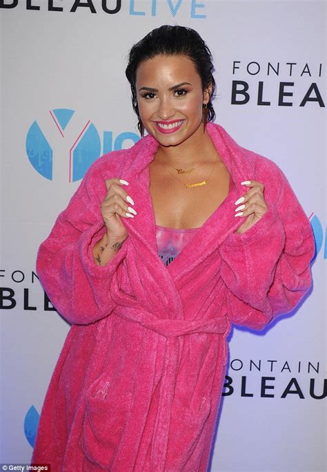 Demi Lovato Continues Cool For Summer Promotional Tour At A Pool Party